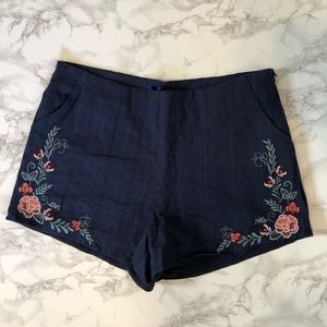 Brand new blue cotton shorts with flower embellishments